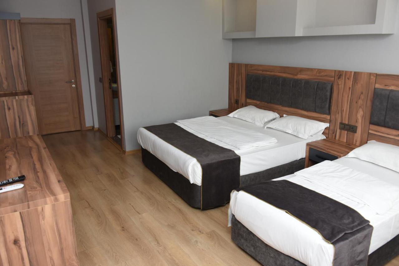 Deluxe Üç Kişilik Oda