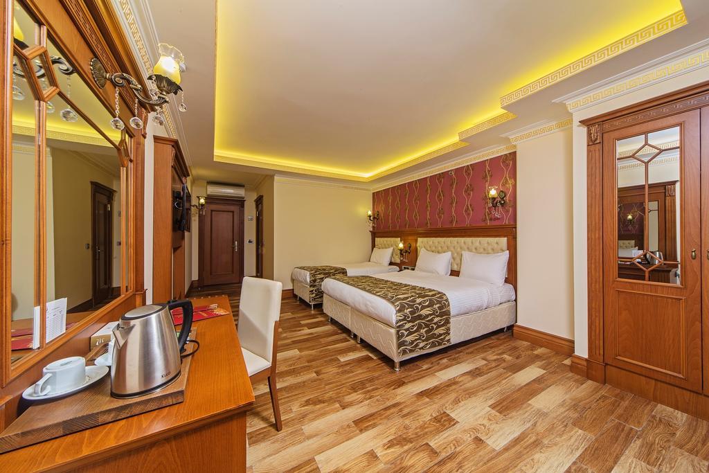 Deluxe Üç Kişilik Oda