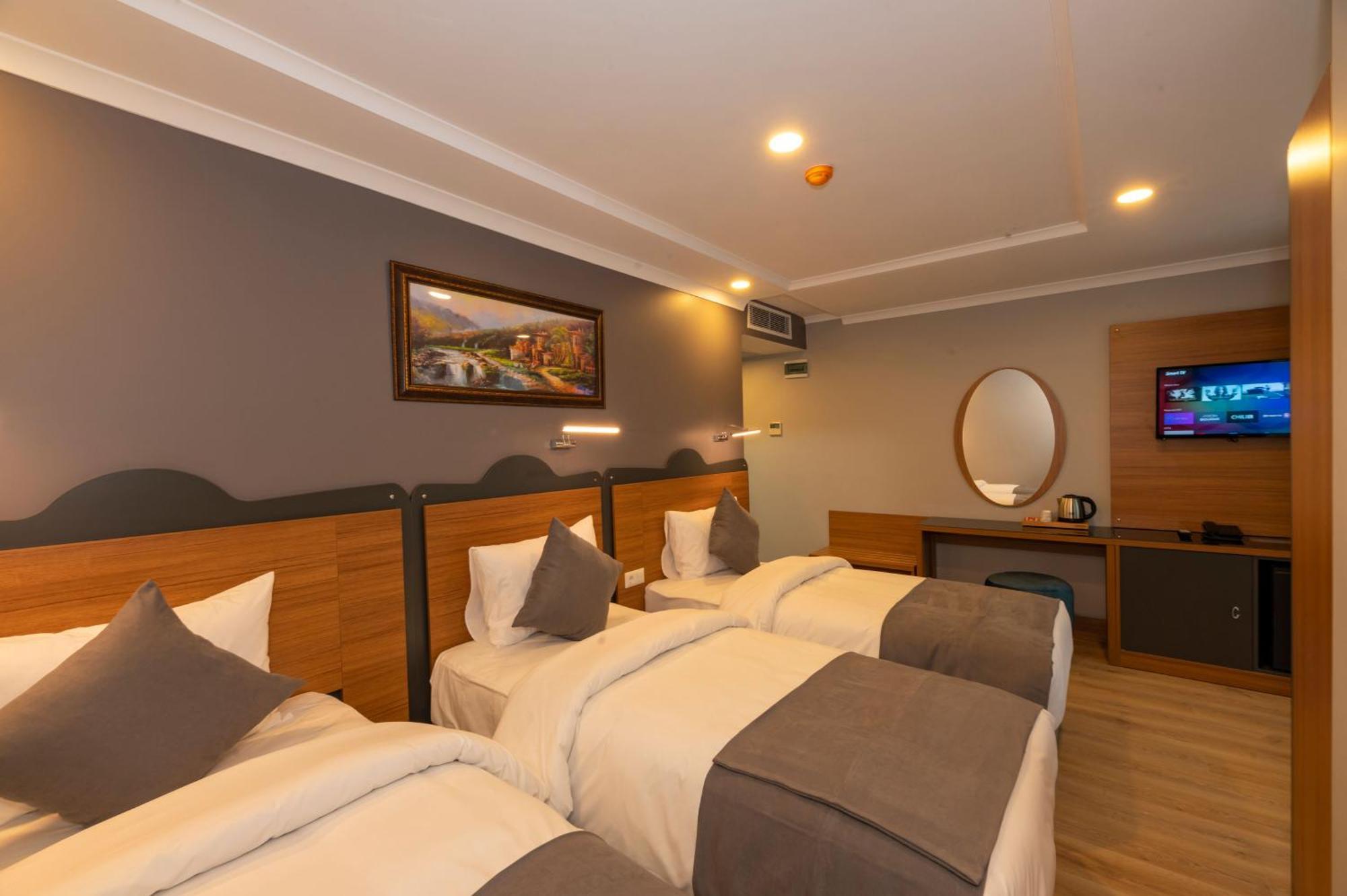 Deluxe Üç Kişilik Oda