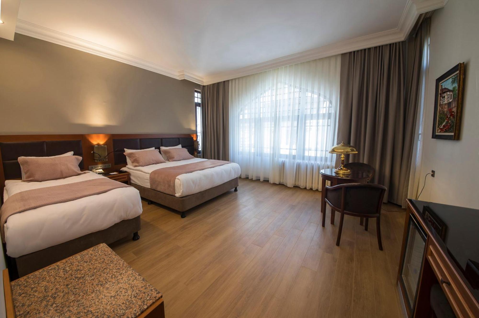 Deluxe Üç Kişilik Oda