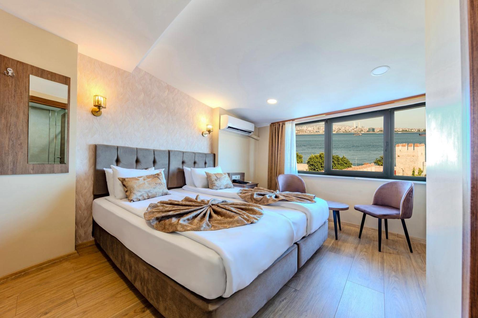Double or Twin Room with Side Sea View