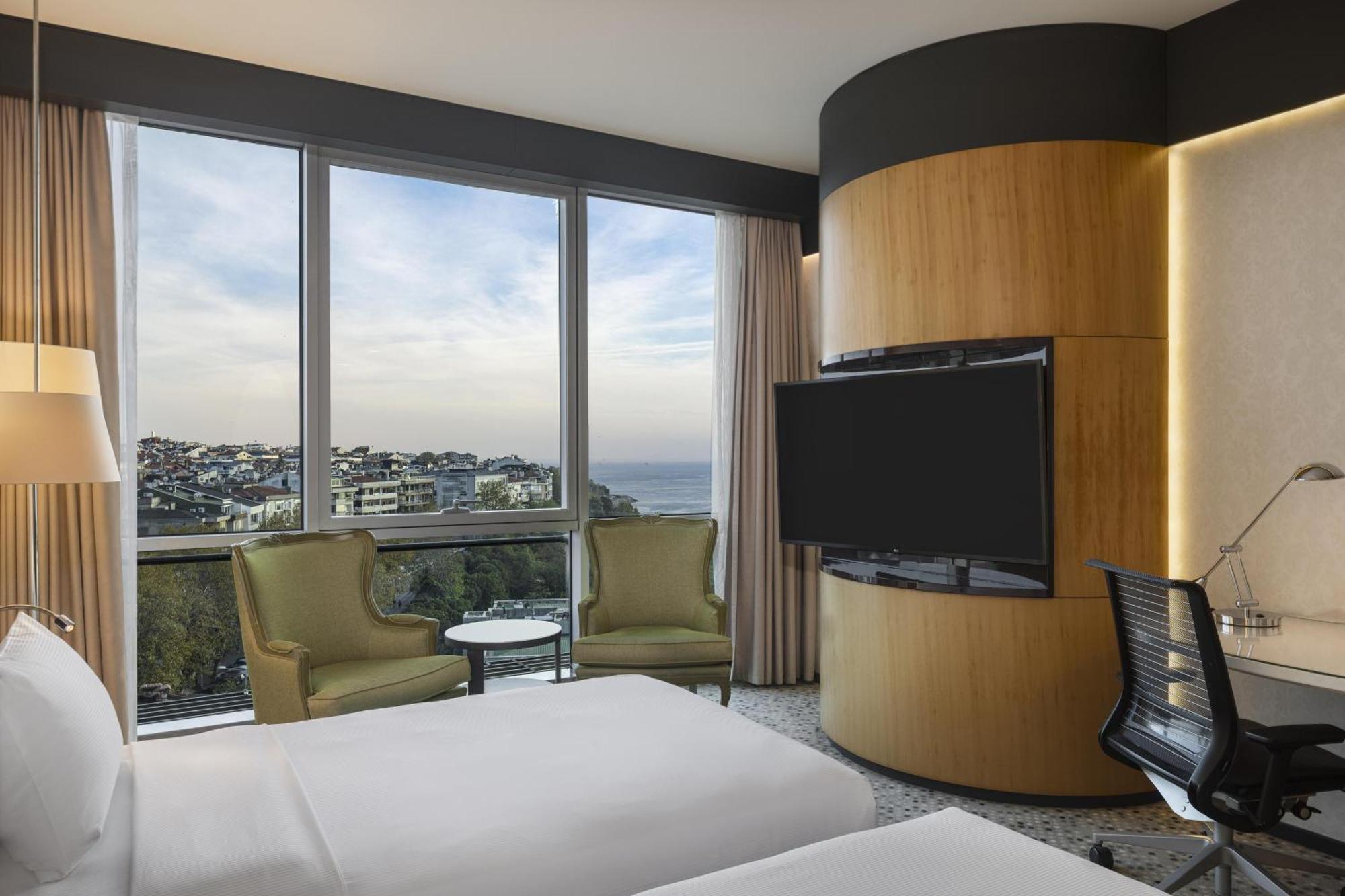 Deluxe Doppelzimmer mit teilweisem Meerblick