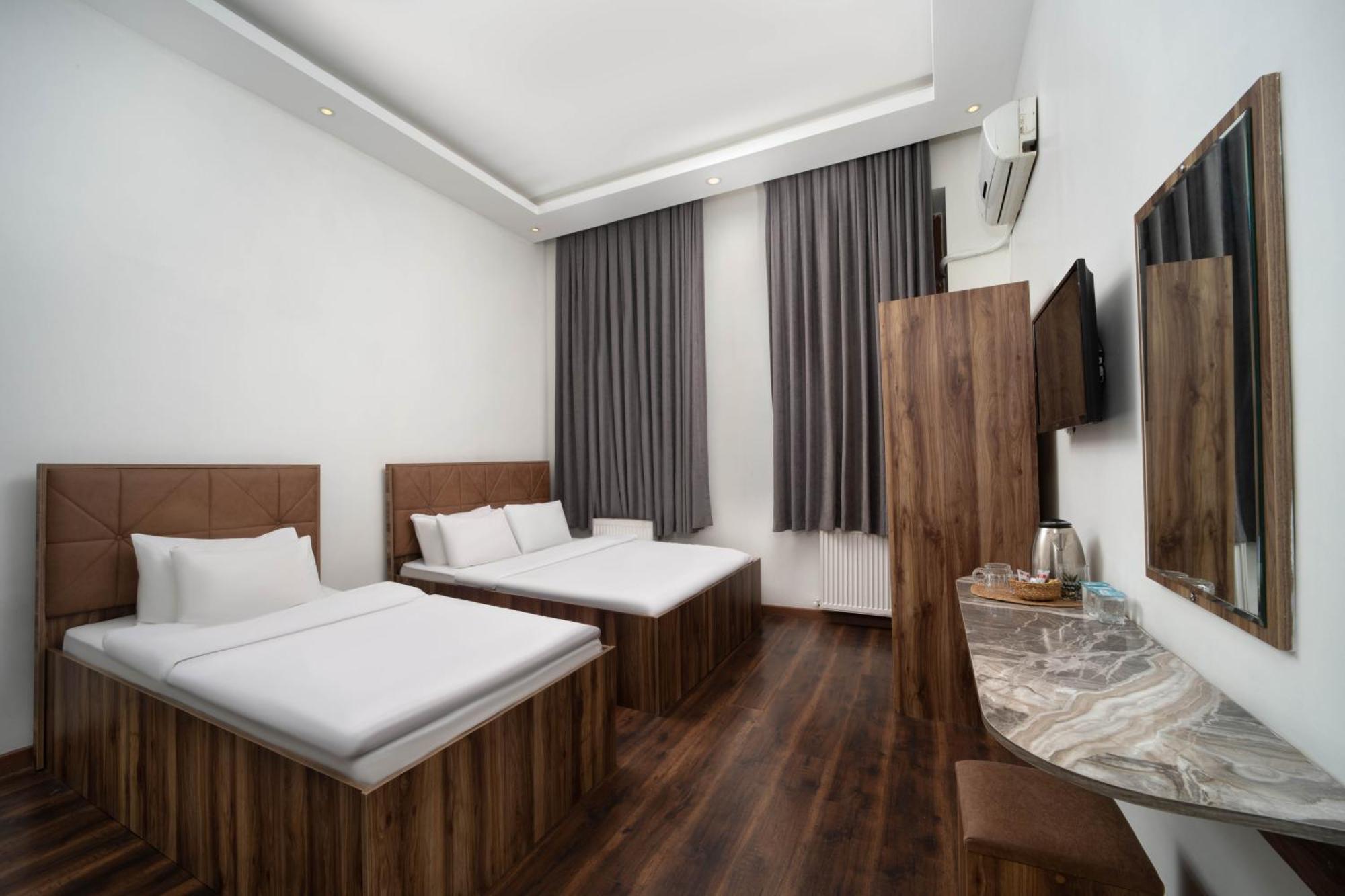 Deluxe Üç Kişilik Oda