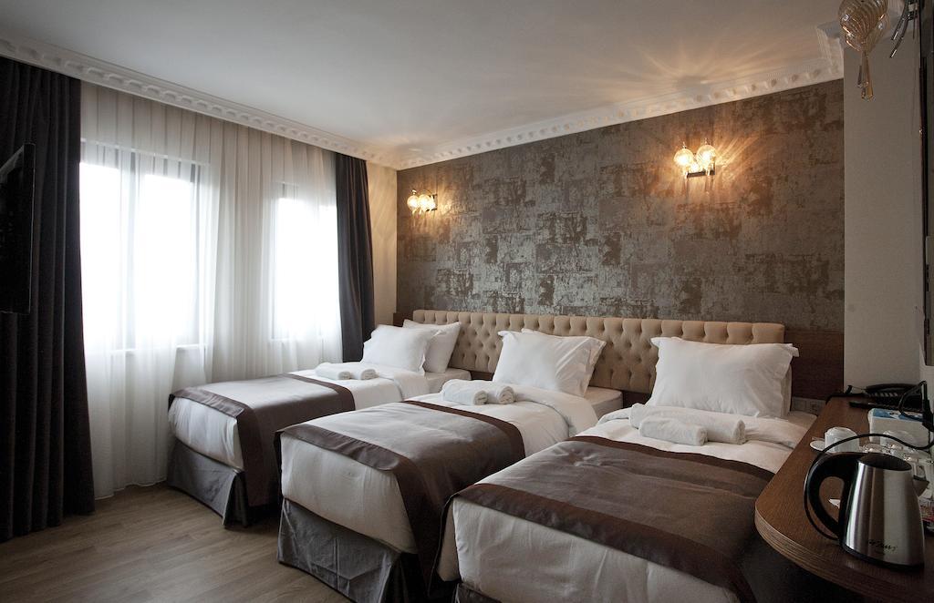 Deluxe Üç Kişilik Oda