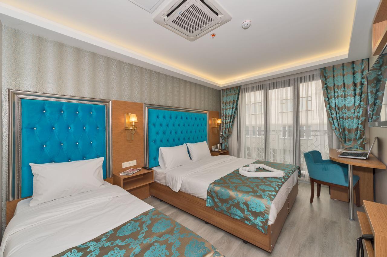 Deluxe Dreibettzimmer